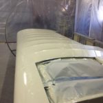 Right wing in paint booth after painting.